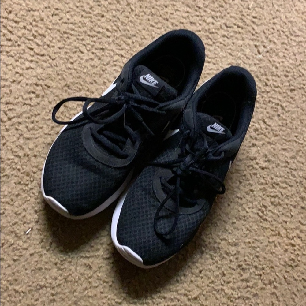 Black Nike running shoes